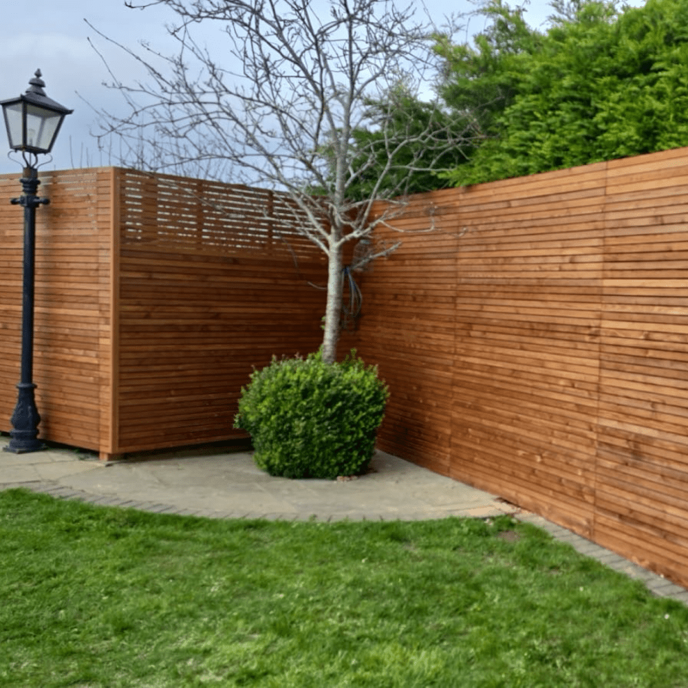 Venetian slatted fencing panel. Design by Contemporary Fencing.