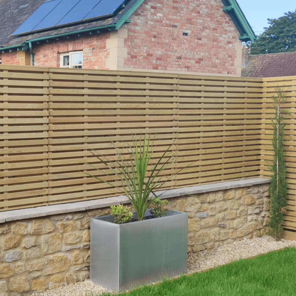 tanlised slatted fencing made from landscaping battens with eased corners