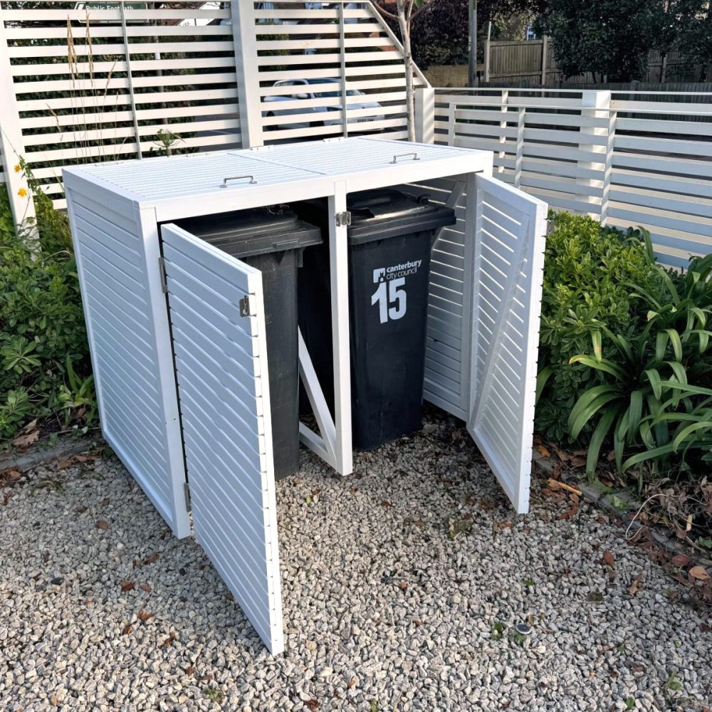 white wheelie bin store in modern front garden