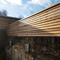slatted fencing on a wall